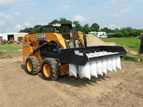 skid steer sand bag attachment|sandbagging skid steer attachment.